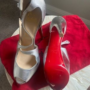 Christian Louboutin, size 40, silver platform heel